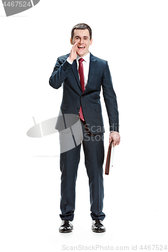 Image of Full body portrait of businessman with folder on white