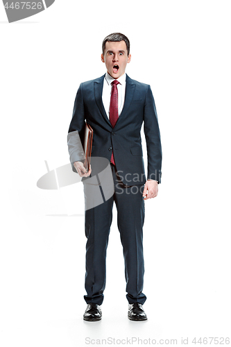 Image of Full body portrait of businessman with folder on white