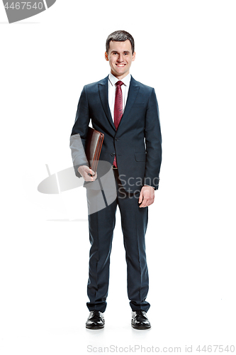 Image of Full body portrait of businessman with folder on white