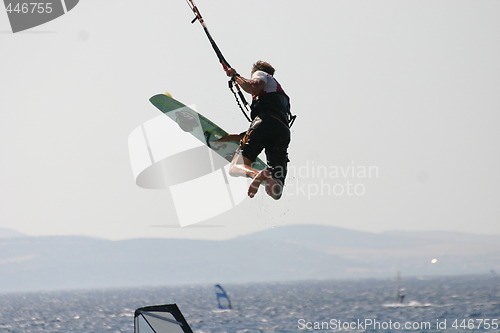 Image of Kite boarding in the air