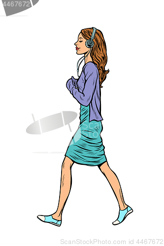 Image of woman in headphones goes