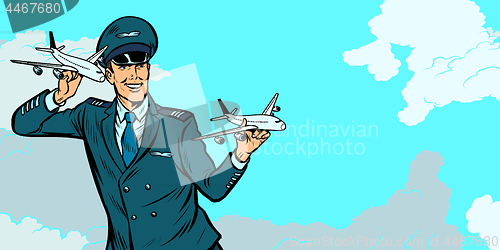 Image of male airplane pilot. Model aircraft in hand