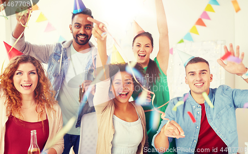 Image of happy team having fun at office party