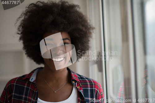 Image of portrait of a young beautiful black woman