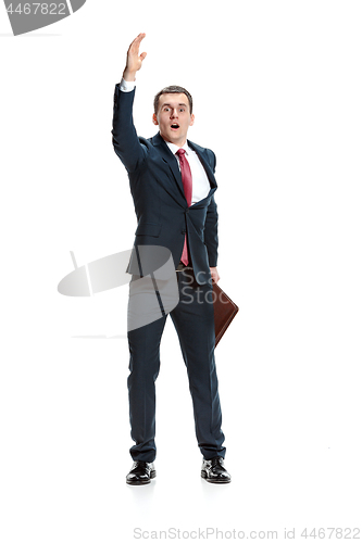 Image of Choose me. Full body view of businessman on white studio background