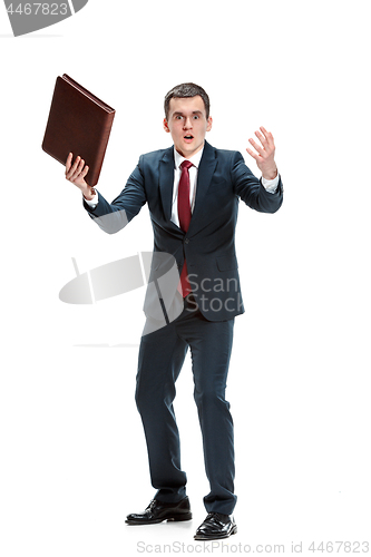 Image of Full body portrait of businessman with folder on white