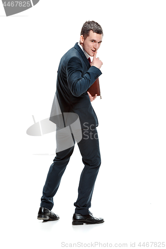 Image of Full body portrait of businessman with folder on white