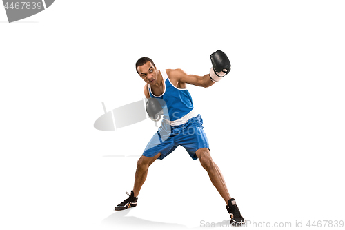 Image of Sporty man during boxing exercise. Photo of boxer on white background