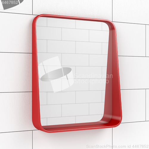 Image of Mirror in the bathroom on tiled wall