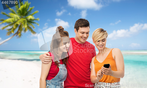 Image of friends with smartphone over beach background