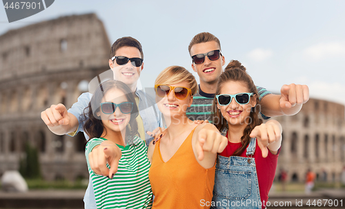 Image of friends in shades pointing at you over coliseum