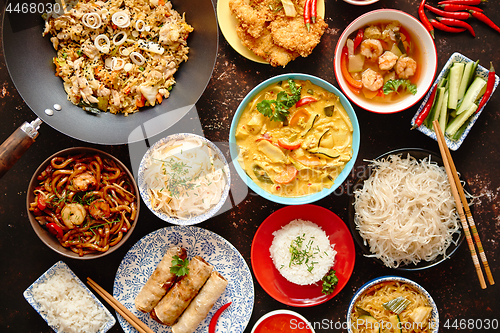 Image of Asian oriental food composition in colorful dishware