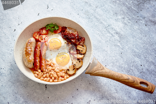 Image of Traditional Full English Breakfast on frying pan.