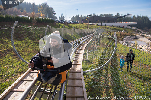 Image of videographer at work on alpine coaster