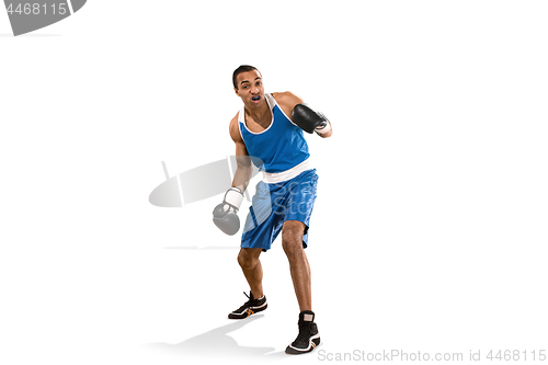 Image of Sporty man during boxing exercise. Photo of boxer on white background