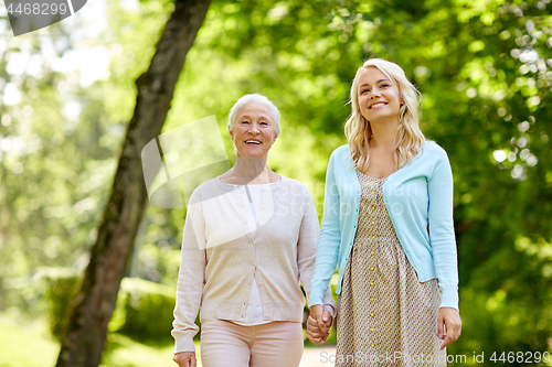 Image of daughter with senior mother at park