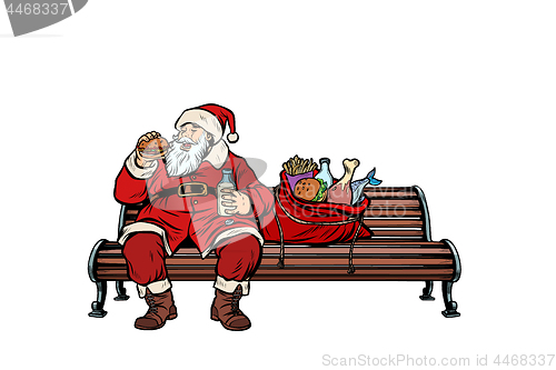 Image of Santa Claus hungry eating on a Park bench