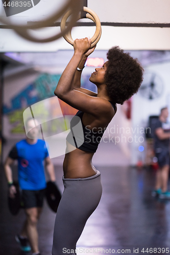 Image of black woman doing dipping exercise