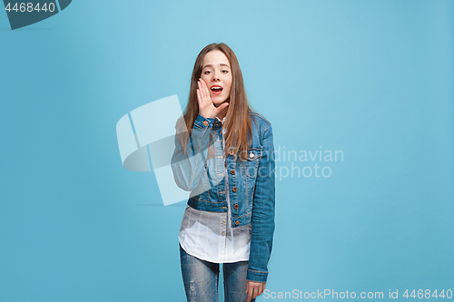 Image of Isolated on pink young casual teen girl shouting at studio