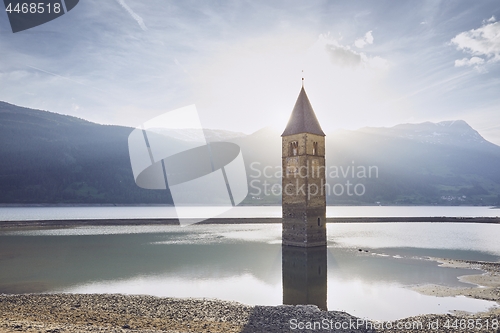 Image of Church tower in lake