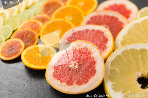 Image of close up of different citrus fruit slices