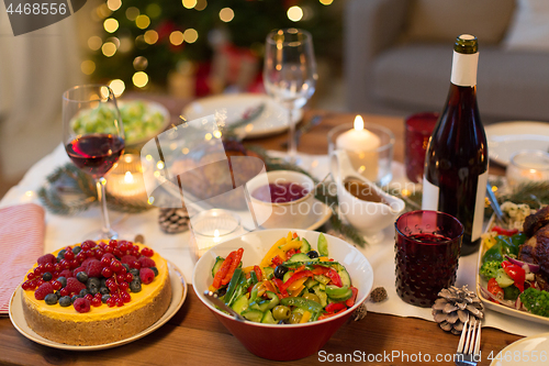 Image of food and drinks on christmas table at home