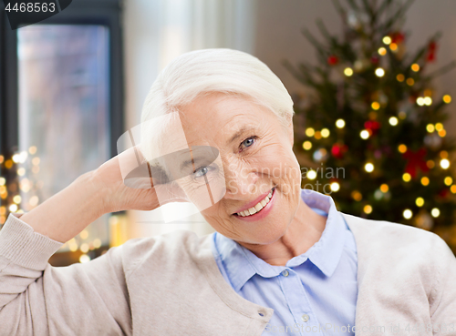 Image of happy senior woman face at home