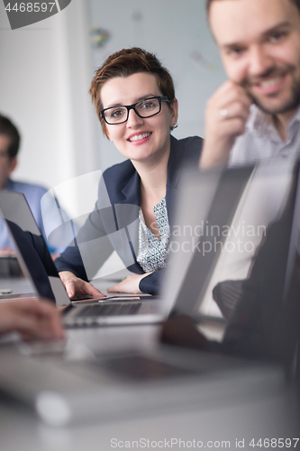 Image of Business Team At A Meeting at modern office building