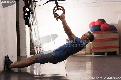 Image of man doing dipping exercise