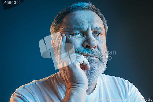 Image of Sports, emotions and fan people concept - sad man watching sports on tv and supporting team at home