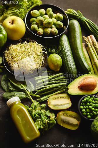 Image of Green healthy food composition with avocado, broccoli, apple, smoothie...