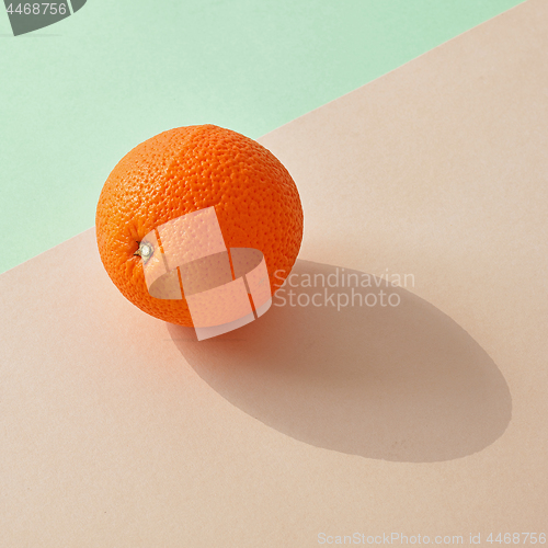 Image of fresh orange on colorful background