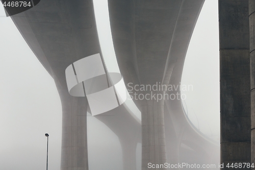 Image of Pillars of the highway bridge in fog