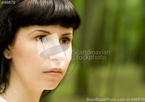 Image of scared girl in forest