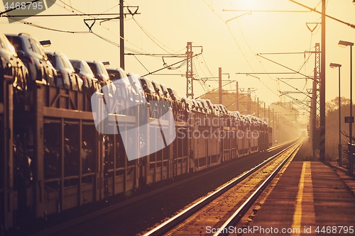 Image of Freight train at sunrise