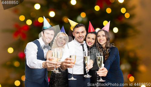 Image of friends with champagne glasses at christmas party