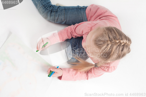 Image of View from above to drawing little girl