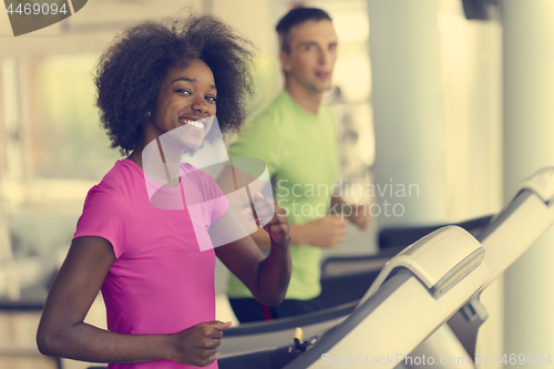 Image of people exercisinng a cardio on treadmill