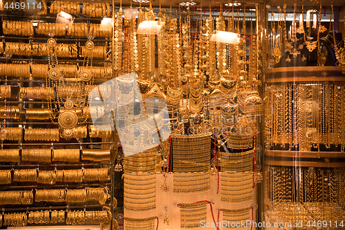 Image of gold jewelry in the shop window