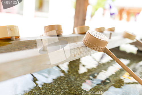 Image of Bamboo water fountain with ladle in Japanese temple