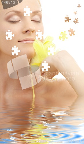 Image of portrait of girl with yellow feathers