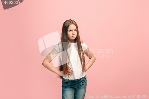 Image of Young serious thoughtful teen girl. Doubt concept.