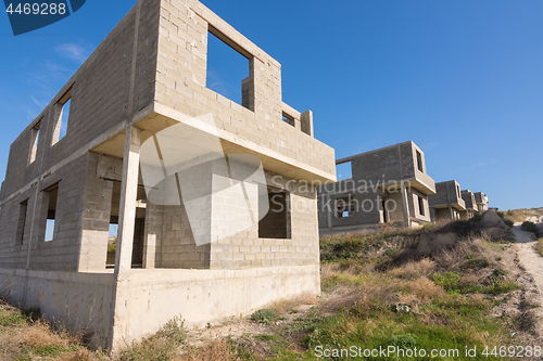 Image of Abandoned construction of several cottages