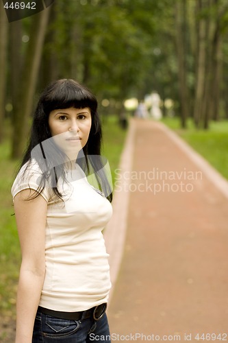 Image of  girl walking in the park