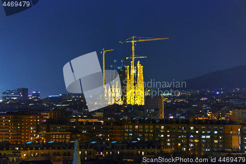 Image of Aerial overview with Sagrada Familia at night time