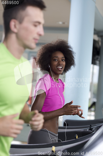 Image of people exercisinng a cardio on treadmill