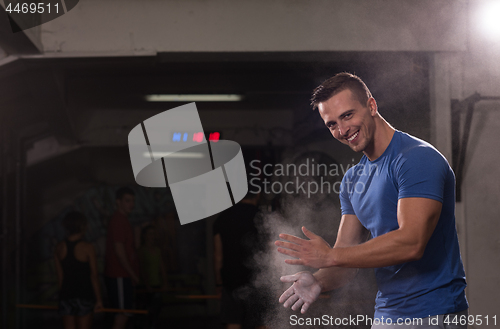 Image of Gym Chalk Magnesium Carbonate hands clapping man