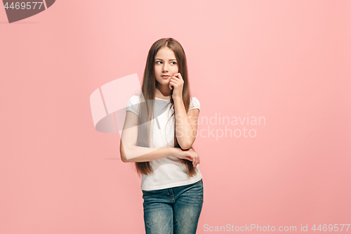 Image of Young serious thoughtful teen girl. Doubt concept.