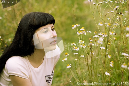 Image of girl relaxing on a meadow