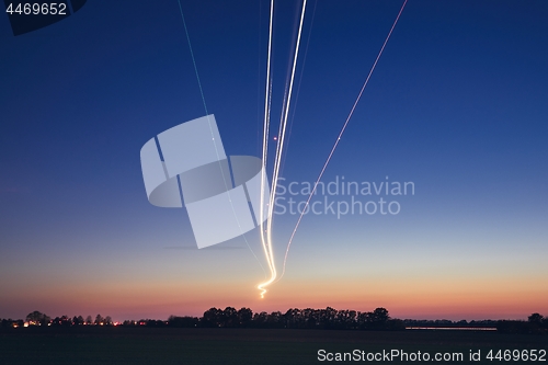 Image of Light trails of airplane during landing